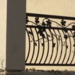 Arced Metal Balusters with Metal Vines