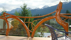 Log Branch Railing with Glass Panels